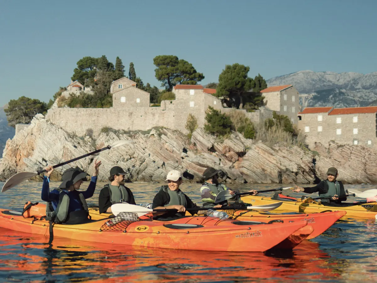 Group of people kayaking near Sveti Stefan island