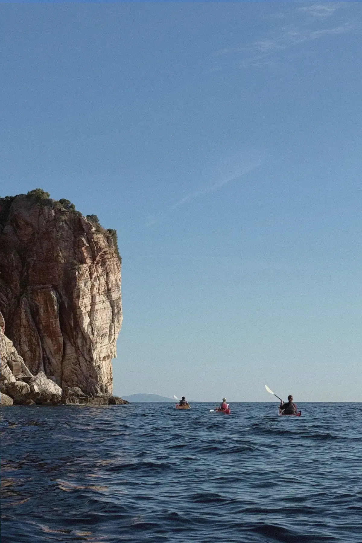Sea kayaking by the cliffs in Petrovac