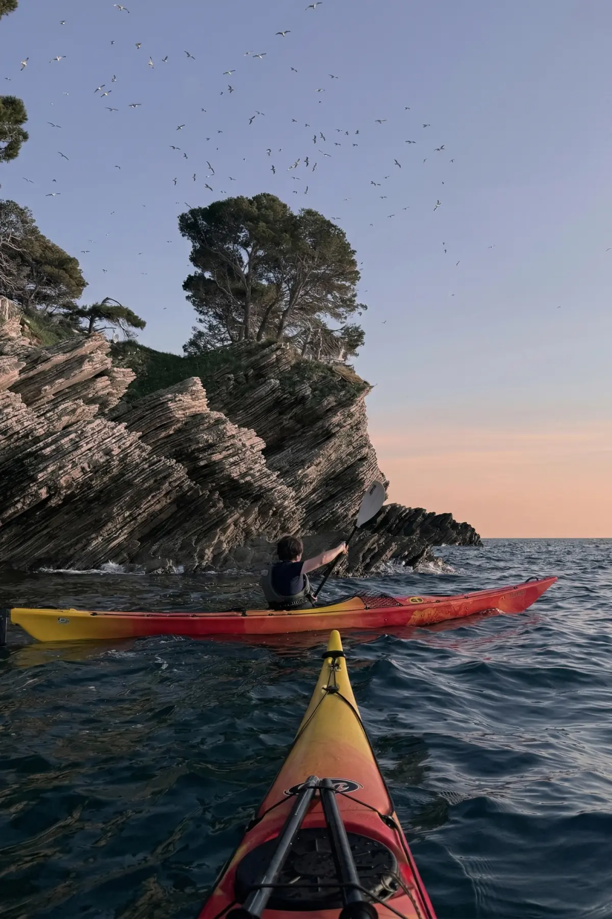 Sea kayaking by the cliffs in Petrovac