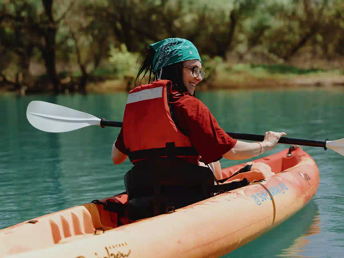 Paddling along the reed-lined River Vranjina toward Vranjina Island